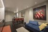 Modern home with Kitchen, Microwave, Recessed Lighting, Engineered Quartz Counter, Cooktops, Ice Maker, Undermount Sink, Refrigerator, Wall Oven, Dark Hardwood Floor, and Dishwasher. Living Space Photo 6 of Hobbit House