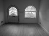 Modern home with Living Room, Light Hardwood Floor, and Corner Fireplace. Entry-BEFORE Photo 16 of Hobbit House