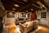 Douglas Fir Beams, Pumpkin Pine Flooring, Wide Plank Flooring, Jotul Stove, Dutch Door, Lanterns, Cozy Living Photo 4 of The Salt Box modern home