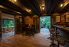 Sized for intimate gatherings, this tavern is not encumbered by its quaint size. The tavern has hosted numerous gathering of over 40 people with caterers, bar tenders, and live music. It has created quite the stir. But totally worth it! Photo 8 of The Tavern modern home