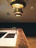 Marble work top and oak timber bar top. Vintage Brass Nautical Lighting. Photo 8 of The Red Barn modern home