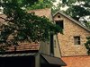 Stone Barn, circa 1745, Bucks County Stone Barn, Cedar Shake Roof, Metal Stand and Seam Roof Photo of The Fleecydale Barn modern home