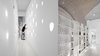 Modern home with Hallway. Inside, the home stands out from the traditional Greek design vernacular. Architects Theo Sarantoglou Lalis and Dora Sweijd experimented with different shapes to create the living room's acoustic ceiling and partition systems. Photo 6 of Villa Ypsilon
