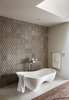 Modern home with Bath Room, Porcelain Tile Floor, Freestanding Tub, Recessed Lighting, and Stone Tile Wall. Master bath Photo 8 of River Garden Trail Residence