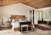Modern home with Bedroom, Bed, Storage, Recessed Lighting, Night Stands, and Light Hardwood Floor. Master bedroom Photo 4 of River Garden Trail Residence
