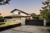 Modern home with Outdoor, Front Yard, and Grass. Exterior - driveway Photo 6 of River Garden Trail Residence