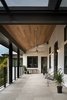 Modern home with Outdoor and Stone Patio, Porch, Deck. Back porch Photo 9 of River Garden Trail Residence