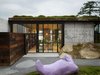 Modern home with Small Patio, Porch, Deck, Exterior, Green Roof Material, Concrete Siding Material, House Building Type, Glass Siding Material, and Flat RoofLine. The Pierre | Olson Kundig Photo 4 of The Pierre