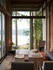 Modern home with Living Room, Coffee Tables, Chair, and Bench. Cabin at Longbranch | Olson Kundig Photo 6 of Cabin in Longbranch