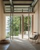 Modern home with Living Room, Chair, and Rug Floor. Cabin at Longbranch | Olson Kundig Photo 7 of Cabin in Longbranch