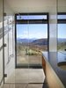 Modern home with Bath Room, Undermount Sink, Concrete Counter, Ceramic Tile Wall, and Full Shower. Studhorse | Olson Kundig Photo 15 of Studhorse