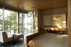 Modern home with Garden, Wood, Chair, Metal, Exterior, Table, Coffee Tables, Closet Storage Type, and Bedroom. Northwoods House Photo 12 of Northwoods House