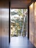 Modern home with Exterior, Wood, Metal, Garden, Coffee Tables, Table, Storage Room, and Chair. Northwoods House Photo 11 of Northwoods House