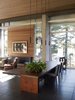 Modern home with Exterior, Wood, Metal, Garden, Sofa, Ceiling Lighting, Coffee Tables, Pendant Lighting, and Dining Room. Northwoods House Photo 8 of Northwoods House