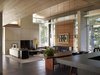Modern home with Exterior, Wood, Metal, Sofa, Coffee Tables, Table, and Dining Room. Northwoods House Photo 6 of Northwoods House