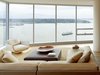 Modern home with Living Room, Sectional, Coffee Tables, Sofa, and End Tables. Harbor Loft | Olson Kundig Photo 7 of Harbor Loft
