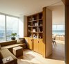 Modern home with Living Room, Sofa, Sectional, and Ottomans. Harbor Loft | Olson Kundig Photo 8 of Harbor Loft
