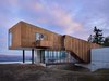 Modern home with House, Metal Roof Material, Metal Siding Material, Outdoor, Back Yard, Large Patio, Porch, Deck, Concrete Patio, Porch, Deck, Infinity Pools, Tubs, Shower, Side Yard, and Front Yard. Rimrock | Olson Kundig Photo 13 of Rimrock