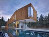 Modern home with House, Metal Roof Material, Metal Siding Material, Outdoor, Infinity Pools, Tubs, Shower, Concrete Patio, Porch, Deck, Large Patio, Porch, Deck, Back Yard, and Side Yard. Rimrock | Olson Kundig Photo 12 of Rimrock