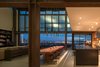 Modern home with Dining Room, Table, Chair, Pendant Lighting, Recessed Lighting, and Concrete Floor. Meg Home | Olson Kundig Photo 5 of Meg Home