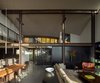 Modern home with Living Room, Sofa, Sectional, Coffee Tables, Console Tables, Bookcase, Pendant Lighting, Ceiling Lighting, Recessed Lighting, and Concrete Floor. Meg Home | Olson Kundig Photo 4 of Meg Home