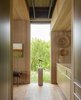 Modern home with Hallway. Fox Island Residence | Olson Kundig Photo 7 of Fox Island Residence