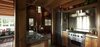 Modern home with Kitchen. Agate Pass Cabin | Original wood siding was saved from the demolition and reused on all kitchen casework. Photo 6 of Agate Pass Cabin