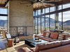 Modern home with Living Room, Sofa, Two-Sided Fireplace, Sectional, Console Tables, Chair, and Coffee Tables. Bigwood Residence | Olson Kundig Photo 12 of Bigwood Residence