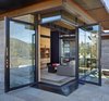 Modern home with Living Room, Sofa, Chair, Bookcase, and Coffee Tables. Bigwood Residence | Olson Kundig Photo 20 of Bigwood Residence