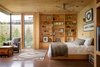 Modern home with Concrete Floor, Bookcase, and Chair. City Cabin | Olson Kundig Photo 18 of City Cabin