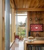 Modern home with Living Room, Sectional, Console Tables, Coffee Tables, Chair, Concrete Floor, and End Tables. City Cabin | Olson Kundig Photo 11 of City Cabin