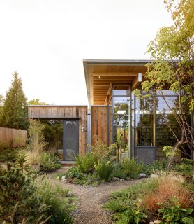 Reclaimed fir from a fruit storage warehouse in Kennewick, Washington, clads the facade and will weather naturally with minimal maintenance.