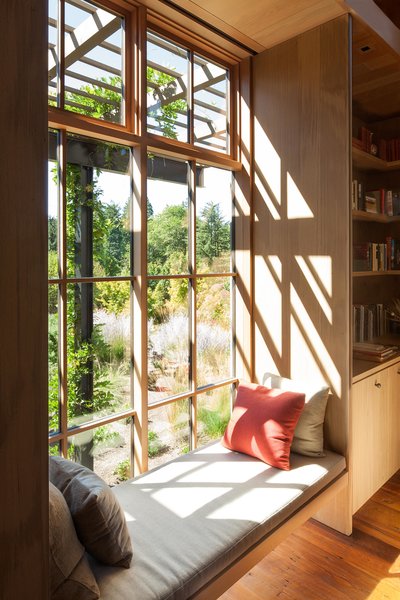 Olson Kundig's Country Garden House ekes out as much window space as possible. Gardens designed in collaboration with notable plantsman Dan Hinkley are visible from every room, and window walls in the living area allow the gardens to become a part of the home.

