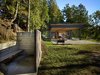 Modern home with Exterior, House Building Type, and Cabin Building Type. "We made the space as flexible as possible to allow for numerous potential uses in all four seasons," says architect Tom Kundig. During the summer months, the property is especially lively as the residents take advantage of their waterfront location. Photo 12 of Pole Pass Retreat