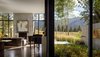 Modern home with Living Room, Console Tables, Sectional, Sofa, Two-Sided Fireplace, and Recessed Lighting. Stirrup House | Olson Kundig Photo 5 of Stirrup House