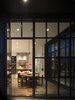 Modern home with Recessed Lighting, Accent Lighting, Chair, and Dark Hardwood Floor. Millerton Farmhouse | Olson Kundig Photo 13 of Millerton Farmhouse