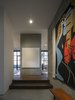Modern home with Hallway, Concrete Floor, and Dark Hardwood Floor. Millerton Farmhouse | Olson Kundig Photo 7 of Millerton Farmhouse