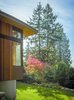 Modern home with Exterior, House Building Type, Wood Siding Material, Curved RoofLine, and Concrete Siding Material. Wave House | Olson Kundig Photo 4 of Wave House