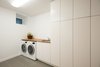 Modern home with Laundry Room, Side-by-Side, Wood Counter, and White Cabinet. Guelph Deep Energy Retrofit - Laundry Room Photo 9 of Guelph Deep Energy Retrofit