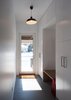 Modern home with Slate Floor, Ceiling Lighting, Pendant Lighting, Doors, and Exterior. Guelph Deep Energy Retrofit - Front Foyer Photo 4 of Guelph Deep Energy Retrofit