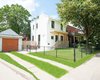 Modern home with Outdoor, Trees, Side Yard, Grass, Front Yard, Wood Patio, Porch, Deck, Horizontal Fences, Wall, Wood Fences, Wall, and Small Patio, Porch, Deck. Our House - Exterior Photo 2 of Our House