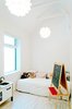 Modern home with Playroom Room Type, Bedroom Room Type, Light Hardwood Floor, Living Room, Storage, Bed, Ceiling Lighting, Pendant Lighting, and Accent Lighting. Our House - Play Room Photo 13 of Our House