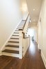 Modern home with Dark Hardwood Floor, Staircase, Wood Tread, and Wood Railing. Bickford Park - Second Floor Stairs Photo 20 of Bickford Park