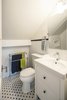 Modern home with Bath Room, Subway Tile Wall, Two Piece Toilet, and Wall Lighting. Bickford Park - Bathroom Photo 6 of Bickford Park