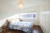 Modern home with Bedroom, Bed, Ceiling Lighting, Night Stands, Storage, Dark Hardwood Floor, Pendant Lighting, and Accent Lighting. Bickford Park - Master Bedroom Photo 19 of Bickford Park