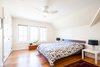 Modern home with Bedroom, Night Stands, Storage, Ceiling Lighting, Bed, Pendant Lighting, and Medium Hardwood Floor. Edwardian Renovation - Guest Bedroom Photo 18 of Edwardian Renovation