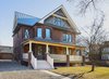 Modern home with Outdoor, Front Yard, Vertical Fences, Wall, Wood Patio, Porch, Deck, Large Patio, Porch, Deck, Wood Fences, Wall, Grass, and Trees. Edwardian Renovation - Exterior Photo 4 of Edwardian Renovation