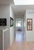 Modern home with Light Hardwood Floor, Staircase, and Wood Railing. Roncesvalles Accessible House - Second Floor Landing Photo 6 of Roncesvalles Accessible House