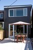 Modern home with Outdoor, Large Patio, Porch, Deck, and Vertical Fences, Wall. Roncesvalles Accessible House - Rooftop Deck Photo 8 of Roncesvalles Accessible House