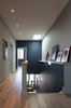 Modern home with Living Room, Ceiling Lighting, Light Hardwood Floor, and Wall Lighting. Elgin Loft - Hallway Photo 9 of Elgin Loft